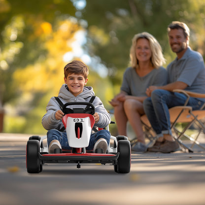 Child driving a red and white go-kart with parents sitting in chairs in the background.